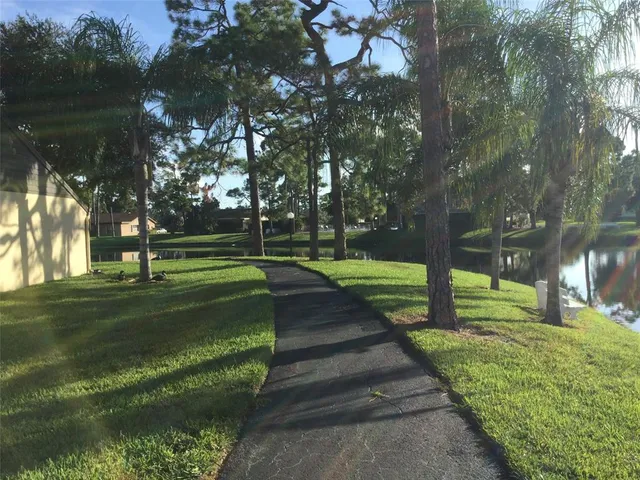 a view of a garden with houses