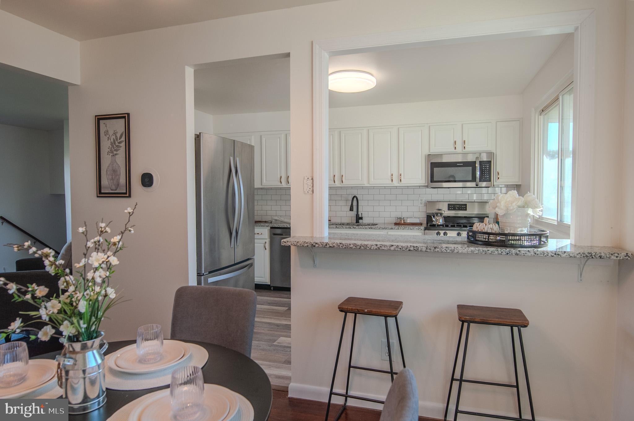 211 Powder Mill Road Edgewater Park, NJ 08010 - Photo 13 of 33 kitchen pass through