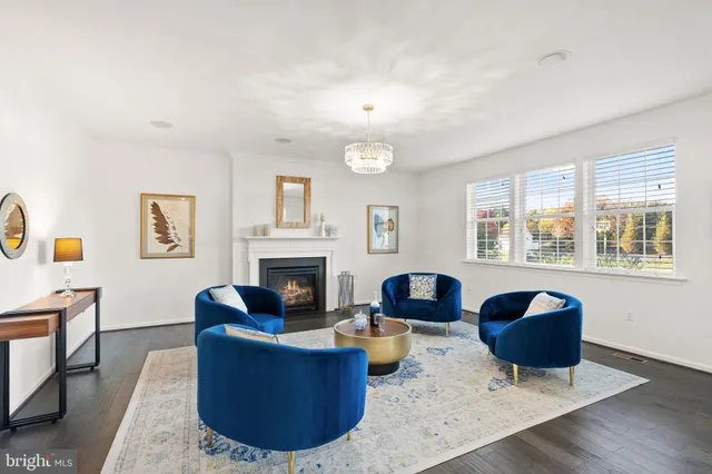 a spacious bedroom with a bed and a couch