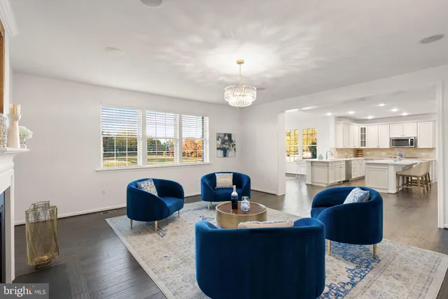 a view of a bedroom with wooden floor and closet