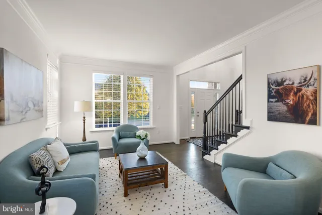 a bathroom with double vanity sink and a mirror