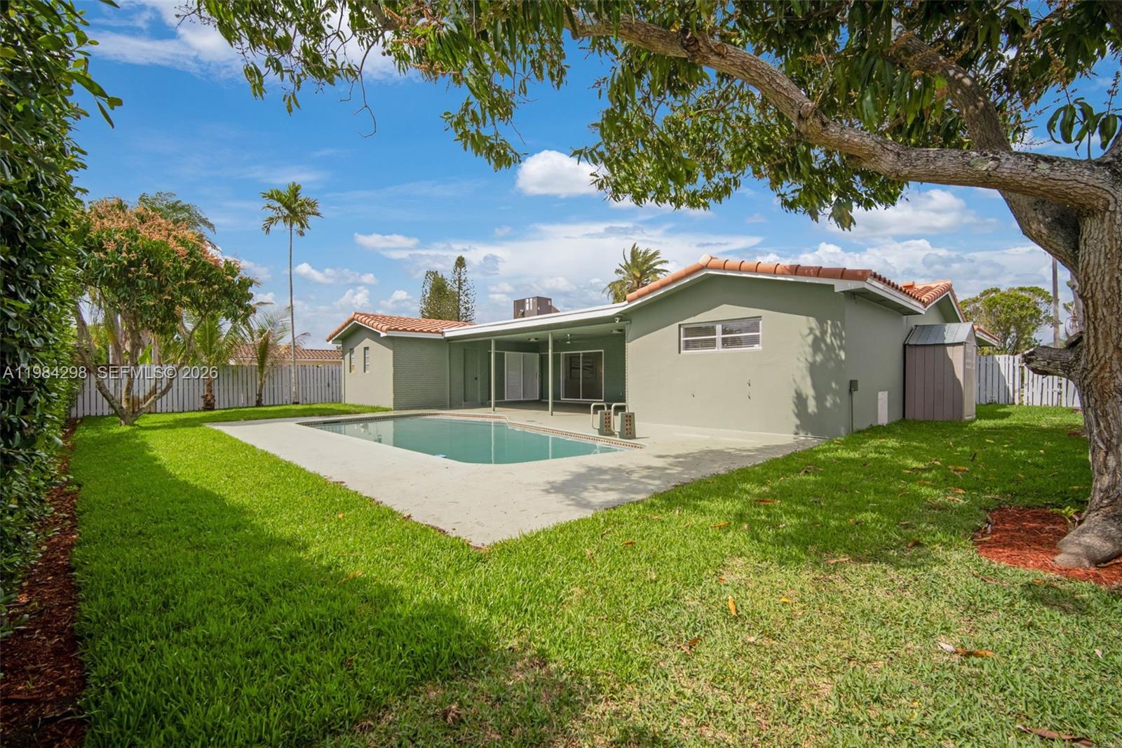 1119 North 46th Terrace Hollywood, FL 33021 - Photo 37 of 41 a view of a house with a yard