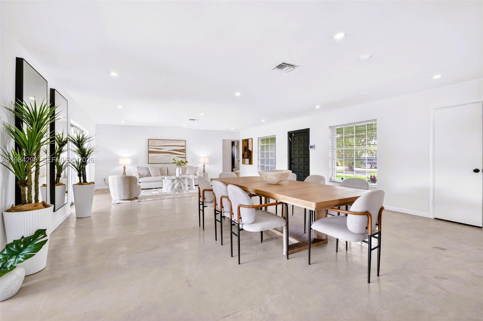 1119 North 46th Terrace Hollywood, FL 33021 - Photo 4 of 41 a dining room with furniture and window