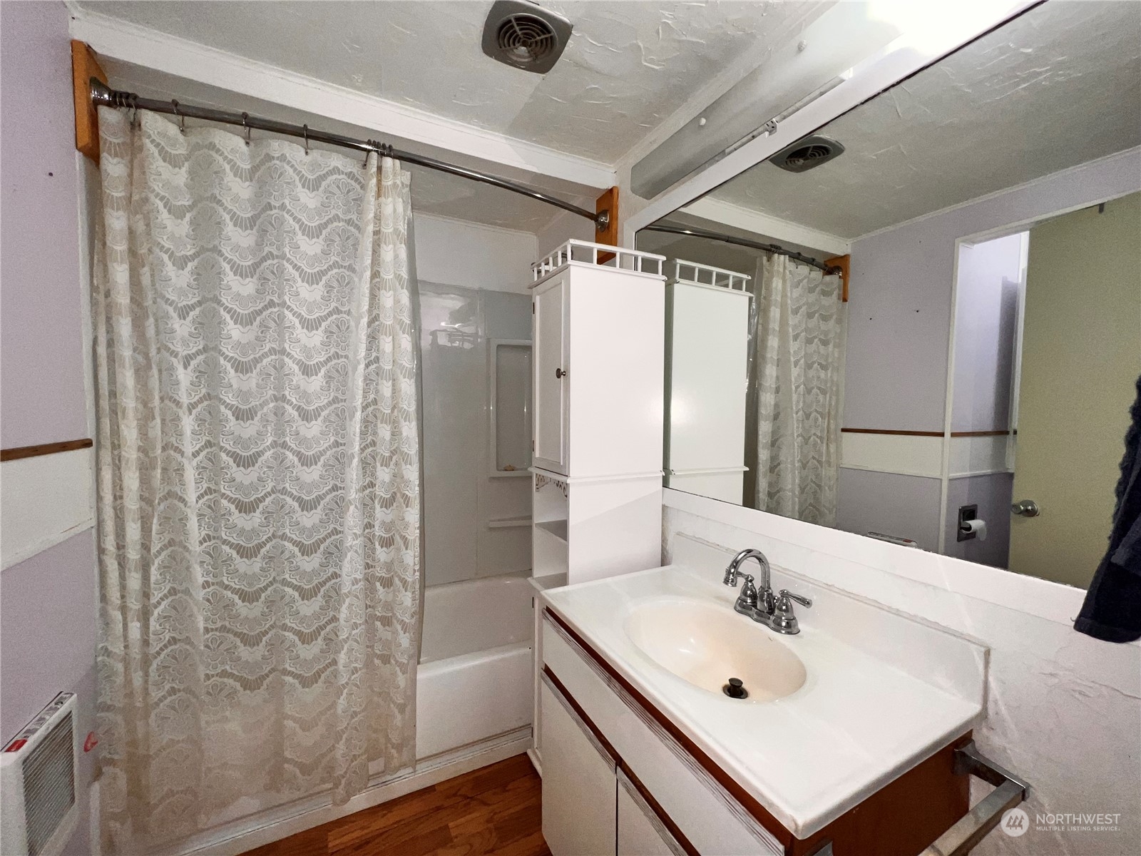 29795 State Rte 20 Republic, WA 99166 - Photo 11 of 30 a bathroom with a sink mirror and shower