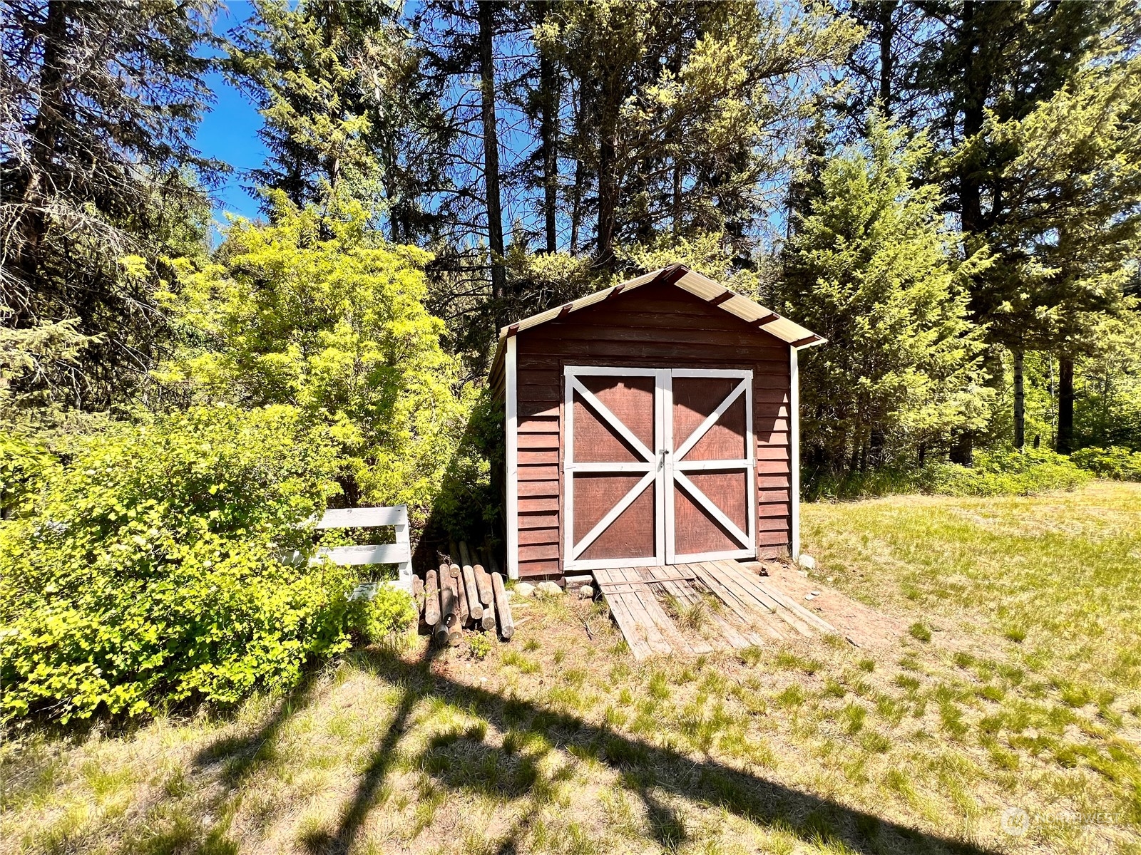 29795 State Rte 20 Republic, WA 99166 - Photo 18 of 30 a front view of a house with a yard