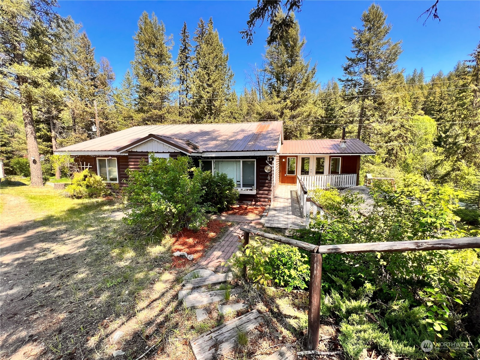 29795 State Rte 20 Republic, WA 99166 - Photo 28 of 30 a front view of a house with a yard
