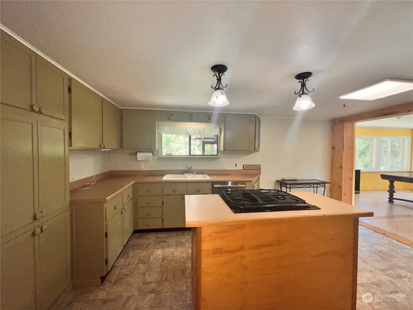 29795 State Rte 20 Republic, WA 99166 - Photo 4 of 30 a kitchen with stainless steel appliances granite countertop a sink a stove and a refrigerator