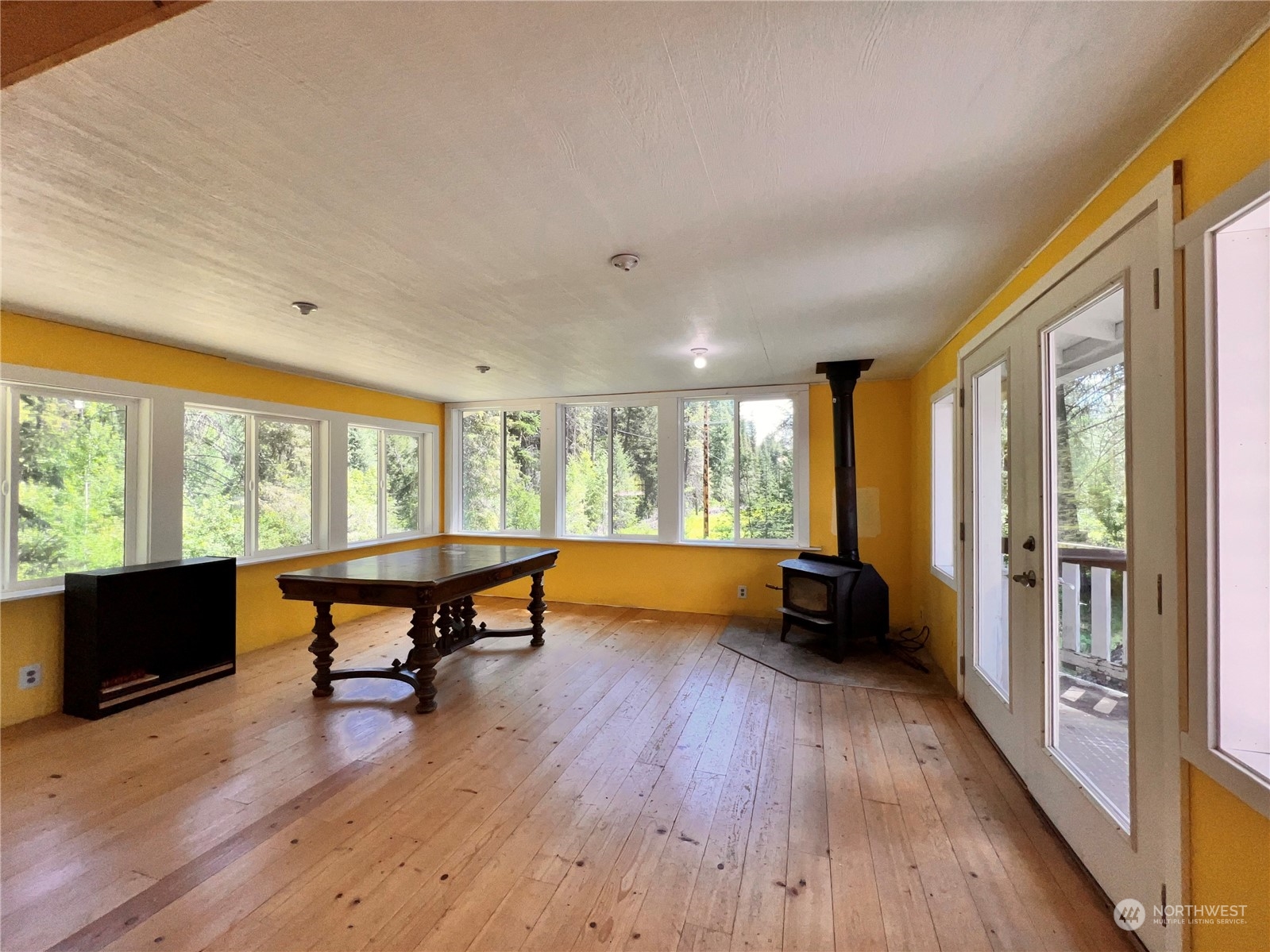29795 State Rte 20 Republic, WA 99166 - Photo 6 of 30 a living room with furniture and a wooden floor