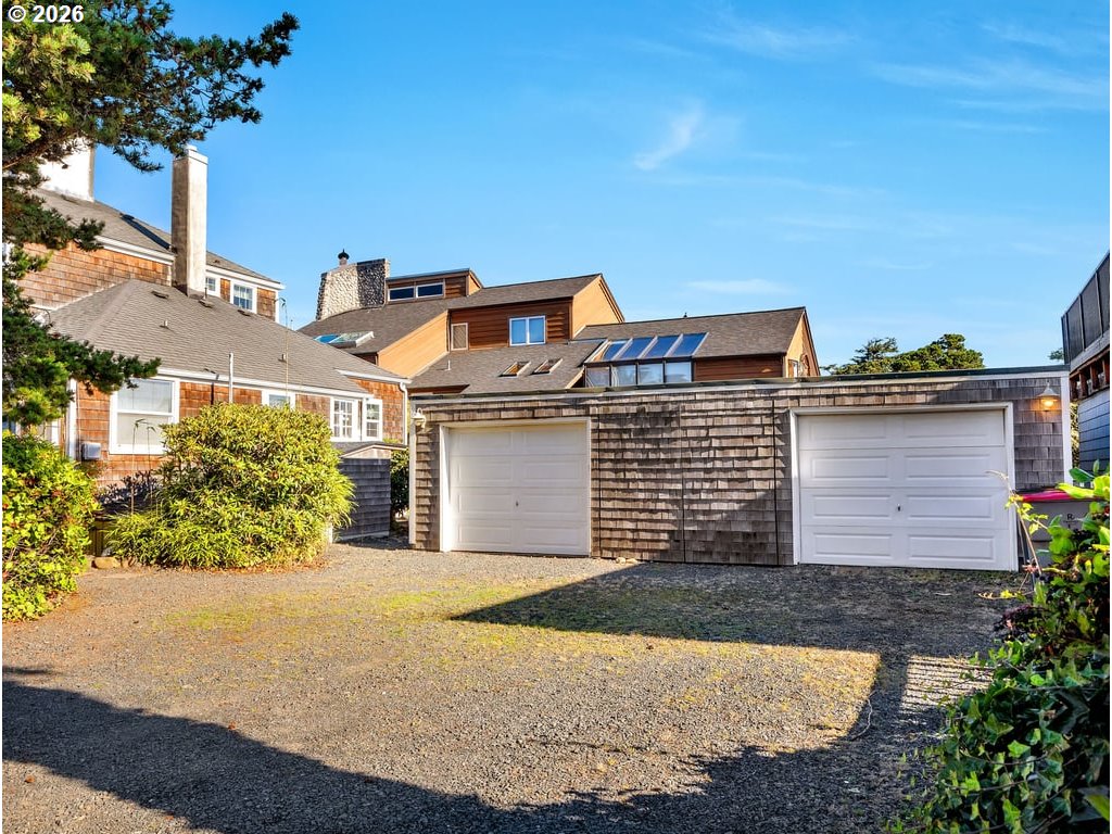 1081 South Promenade Seaside, OR 97138 - Photo 30 of 39 a front view of a house with a yard
