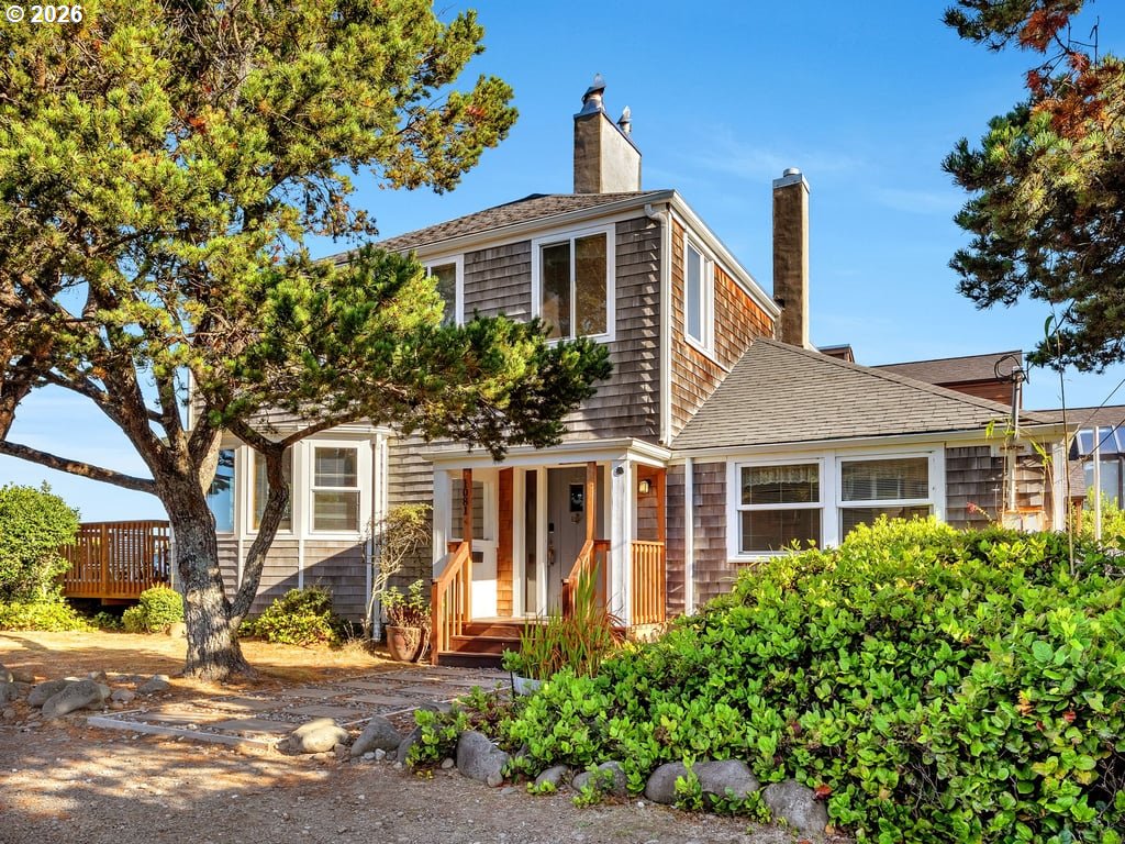 1081 South Promenade Seaside, OR 97138 - Photo 35 of 39 a front view of a house with a tree