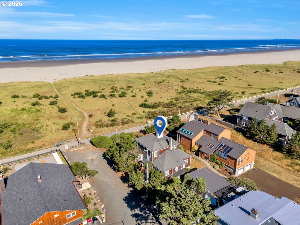 1081 South Promenade Seaside, OR 97138 - Photo 4 of 39 an aerial view of ocean and residential houses with outdoor space