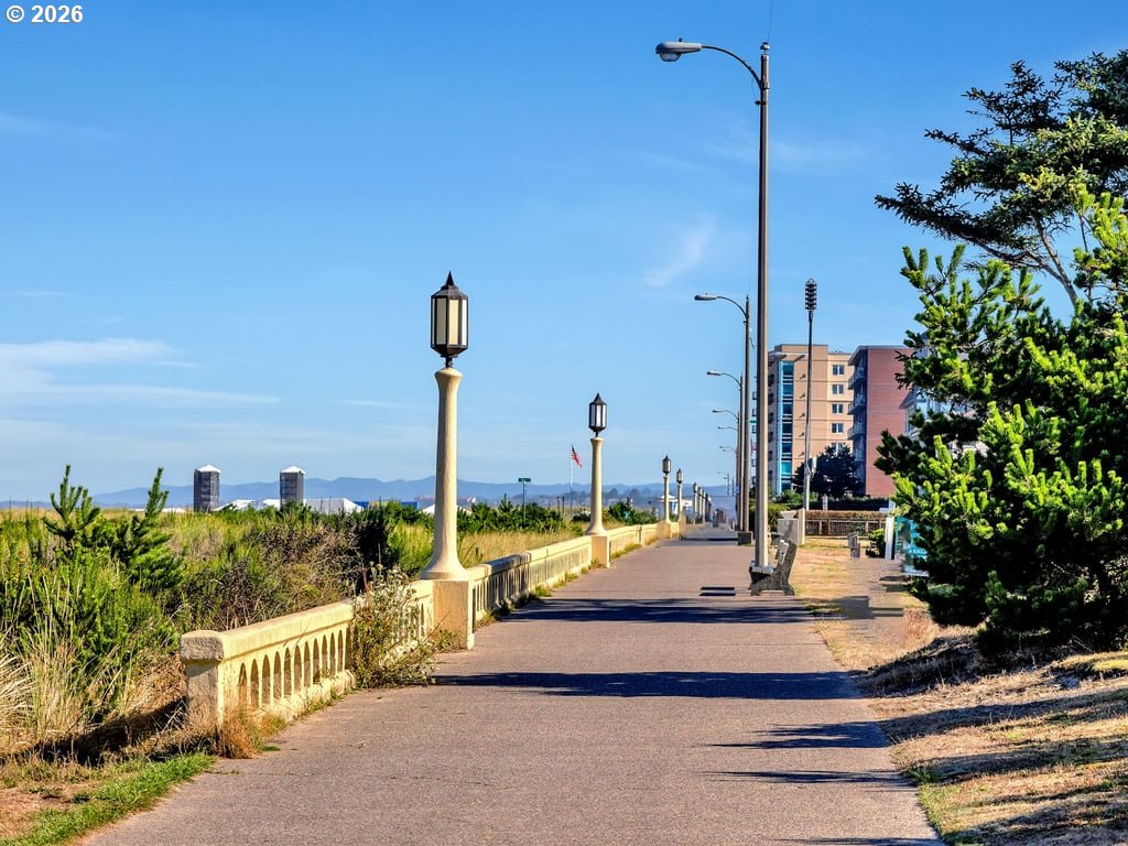 1081 South Promenade Seaside, OR 97138 - Photo 5 of 39 a view of a ocean with boats and palm trees