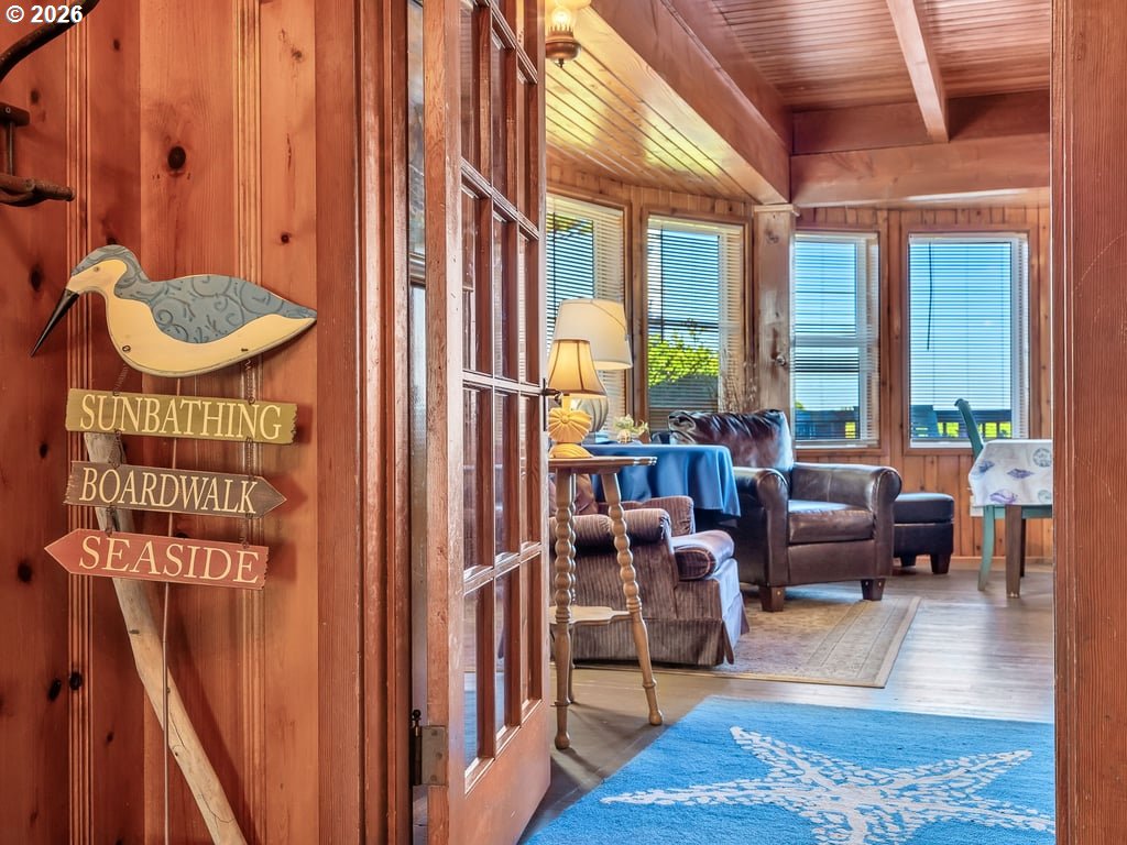 1081 South Promenade Seaside, OR 97138 - Photo 8 of 39 a living room with furniture and a large window