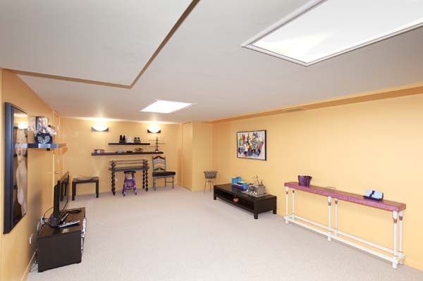 144 Wellington Road Northbrook, IL 60062 - Photo 14 of 20 a view of a room with gym equipment