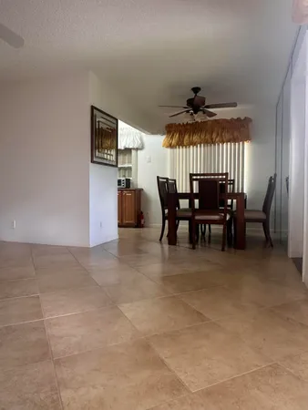a view of a livingroom with furniture