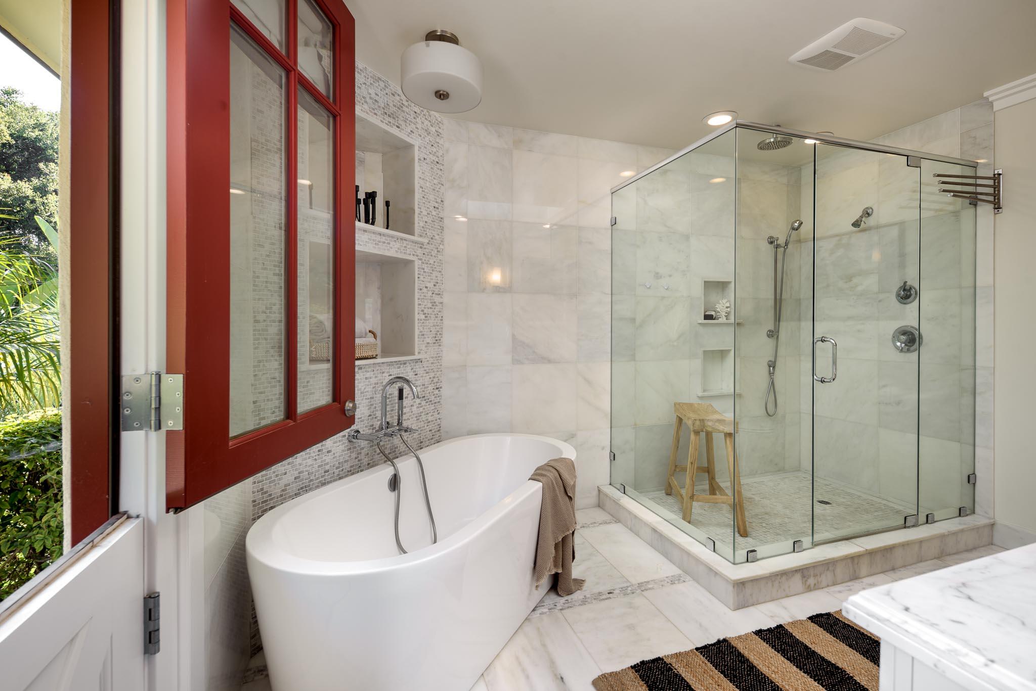 4375 Via Glorieta Santa Barbara, CA 93110 - Photo 13 of 36 a bathroom with a bathtub and shower