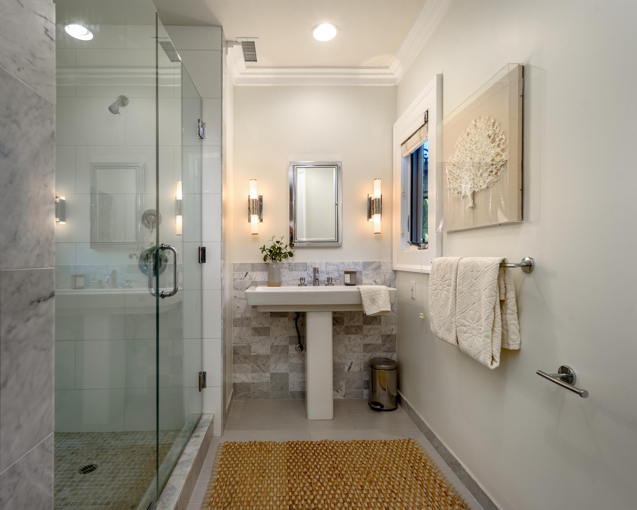 4375 Via Glorieta Santa Barbara, CA 93110 - Photo 15 of 36 a bathroom with a sink a toilet and shower