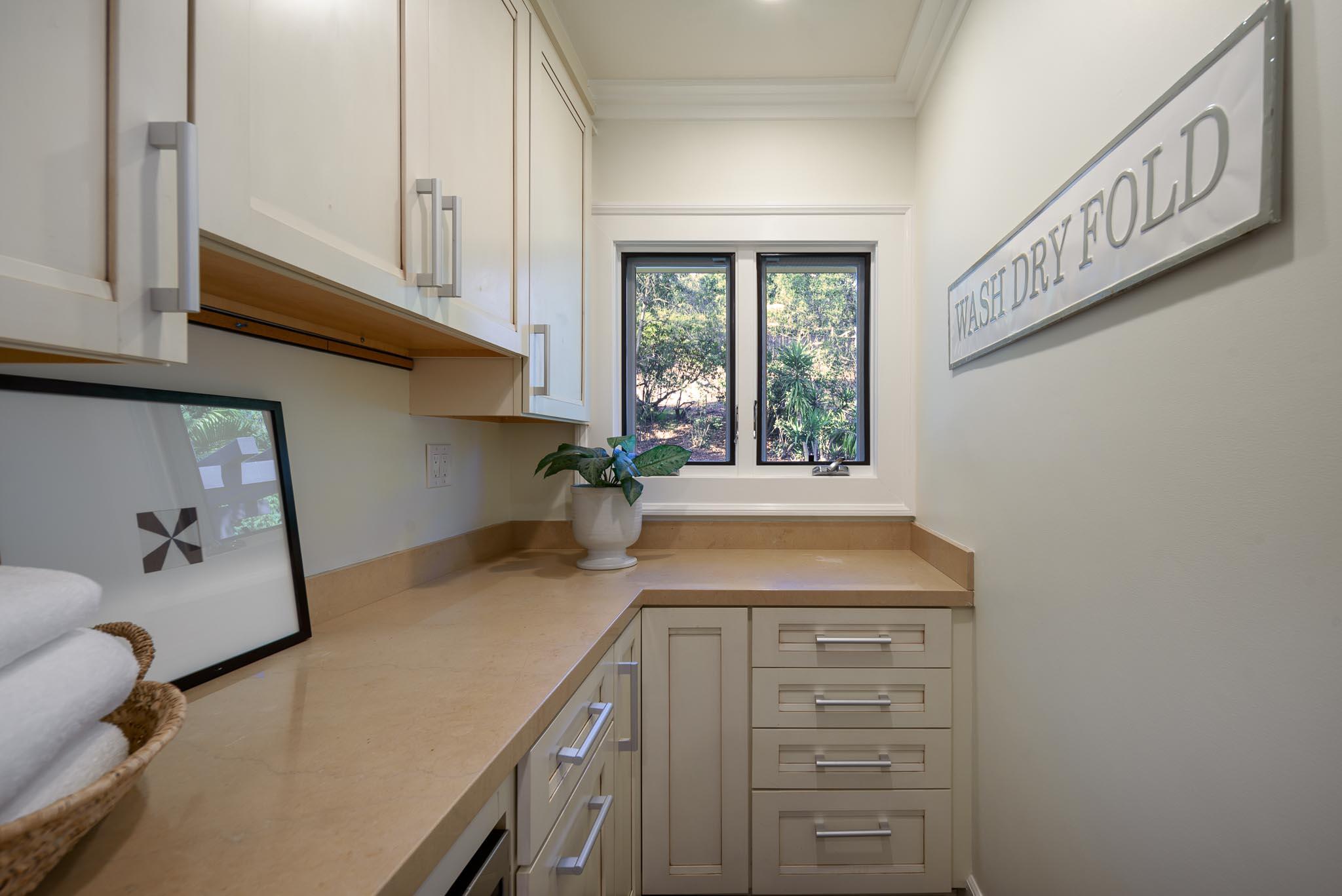 4375 Via Glorieta Santa Barbara, CA 93110 - Photo 19 of 36 a kitchen with cabinets and window