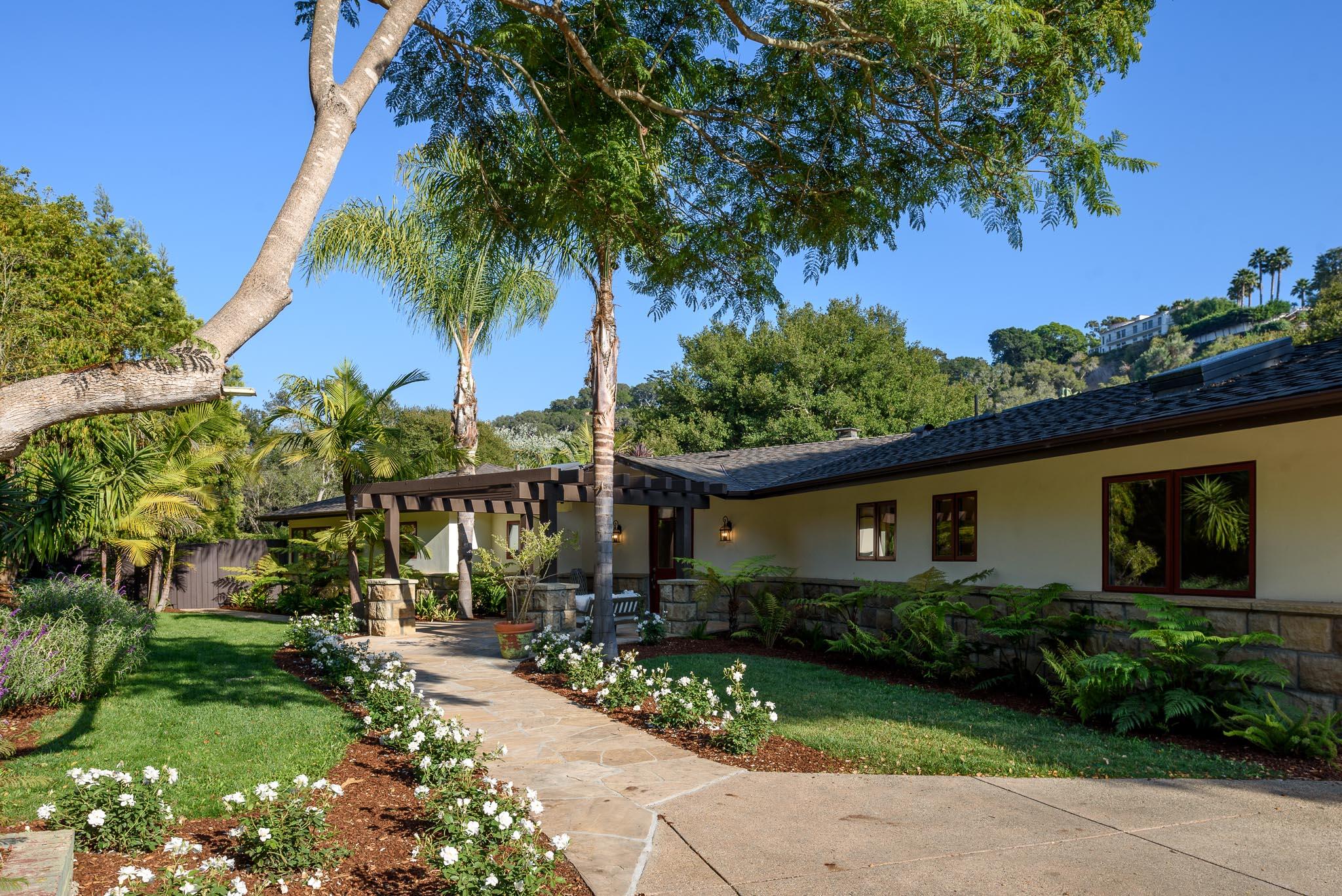 4375 Via Glorieta Santa Barbara, CA 93110 - Photo 2 of 36 a front view of a house with garden