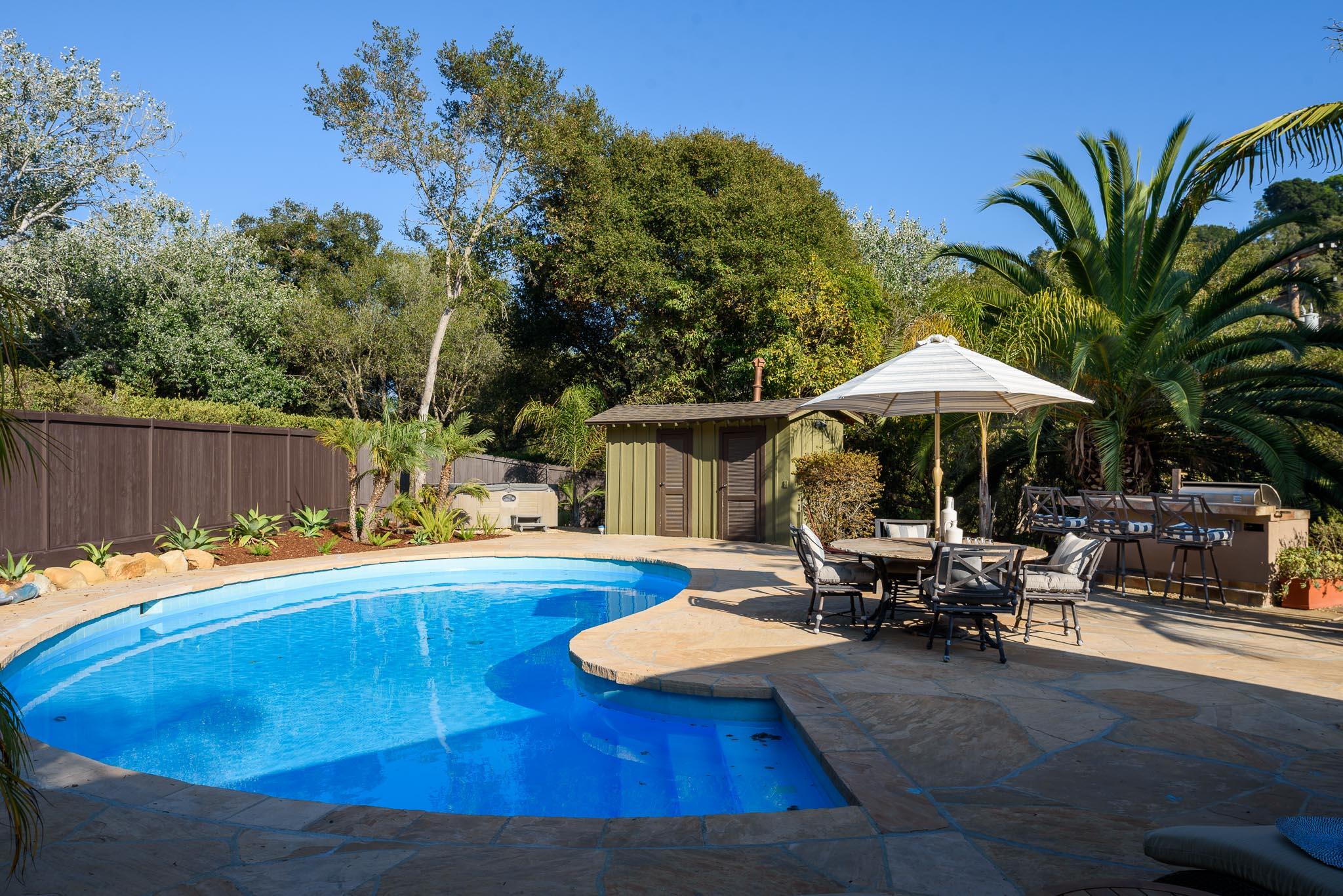 4375 Via Glorieta Santa Barbara, CA 93110 - Photo 21 of 36 a view of a house with swimming pool and sitting area