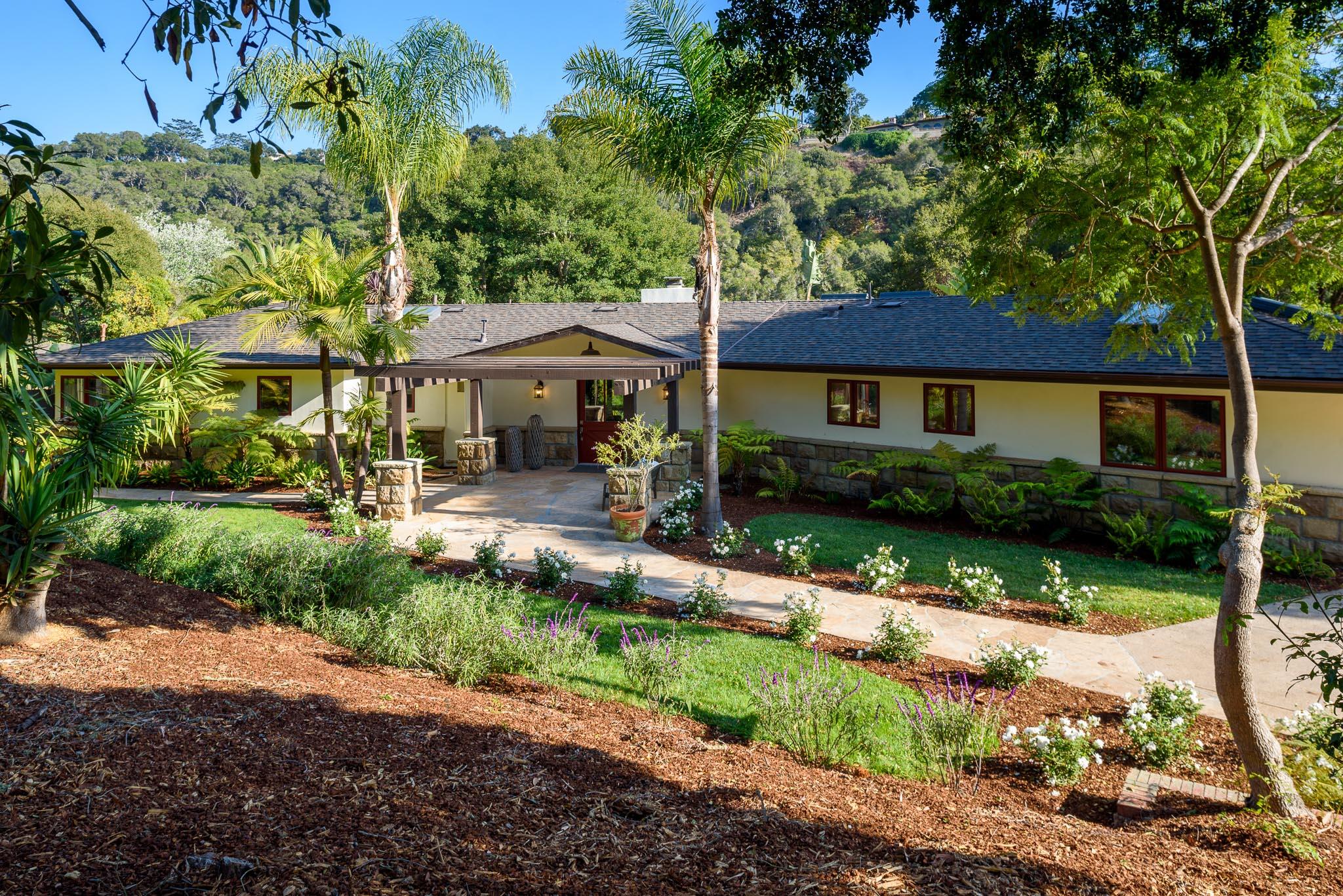 4375 Via Glorieta Santa Barbara, CA 93110 - Photo 29 of 36 a front view of a house with a yard