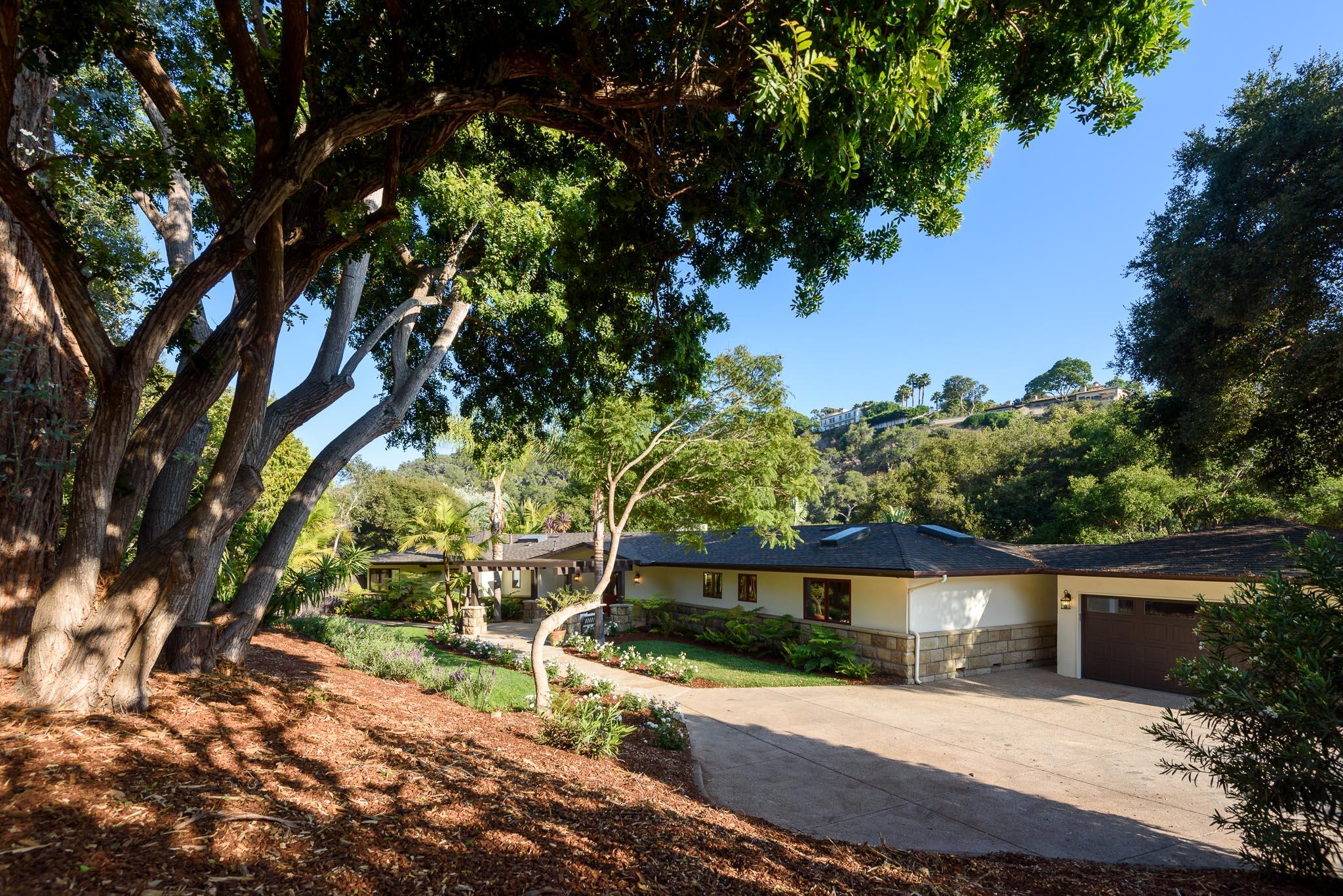 4375 Via Glorieta Santa Barbara, CA 93110 - Photo 30 of 36 a front view of a house with a yard