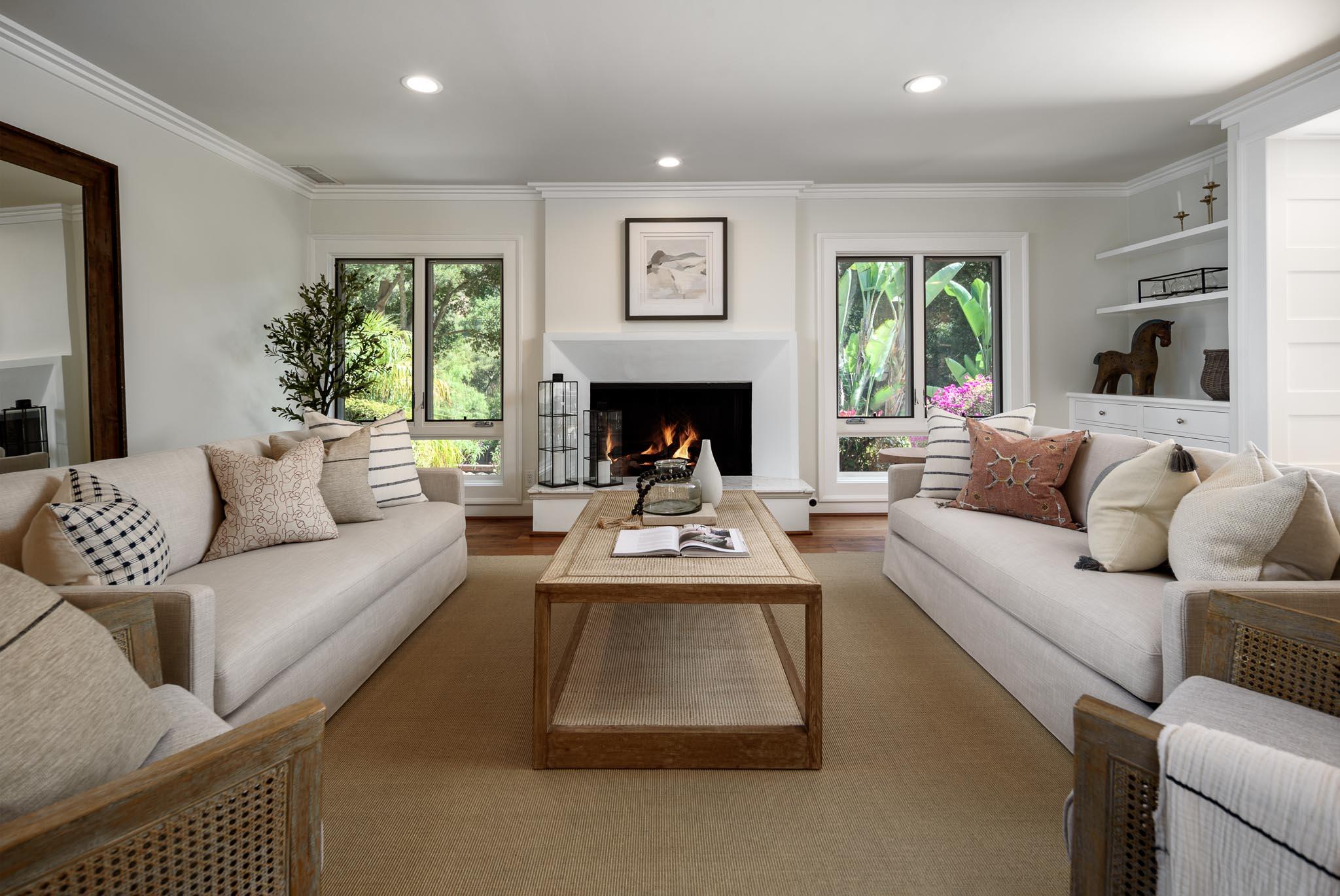4375 Via Glorieta Santa Barbara, CA 93110 - Photo 3 of 36 a living room with furniture and a fireplace