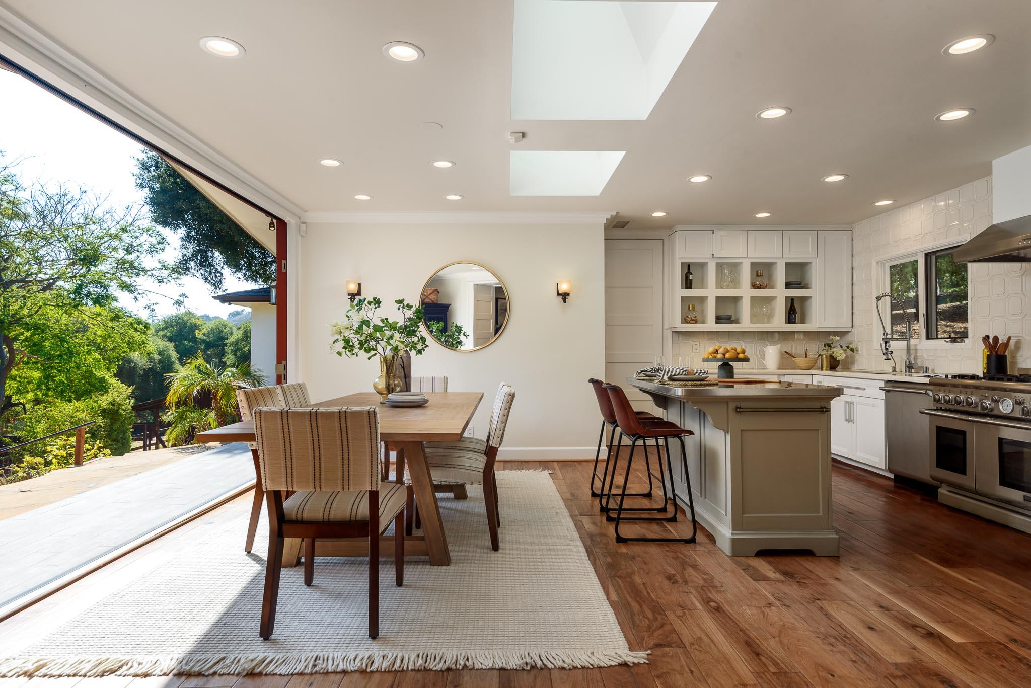 4375 Via Glorieta Santa Barbara, CA 93110 - Photo 6 of 36 a view of a dining room with furniture and wooden floor