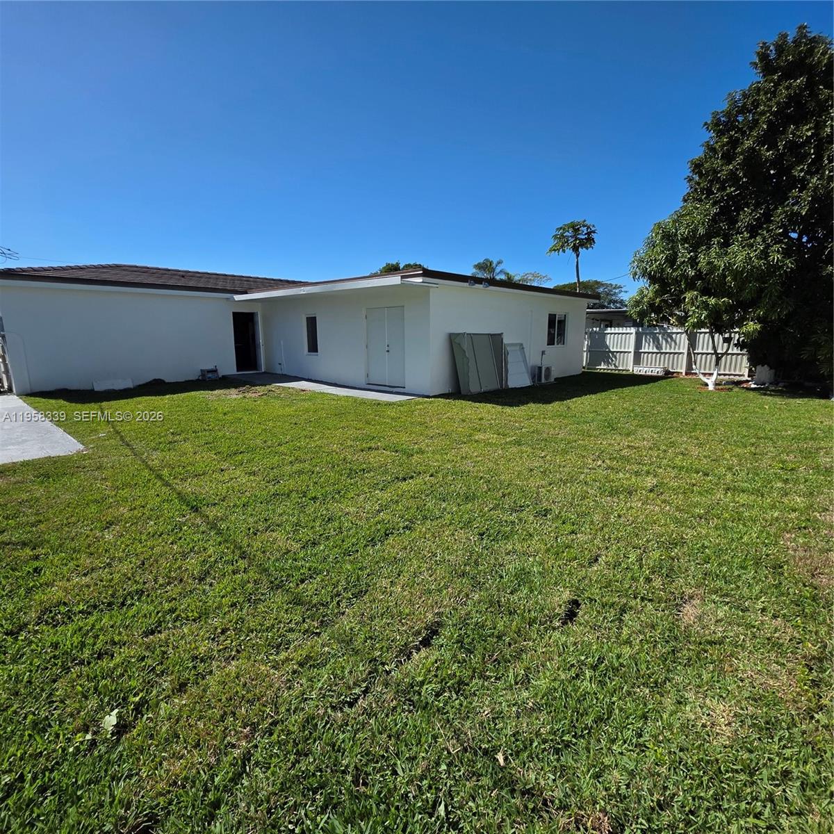 7555 Southwest 28th Street Road Miami, FL 33155 - Photo 10 of 11 a house view with a space space