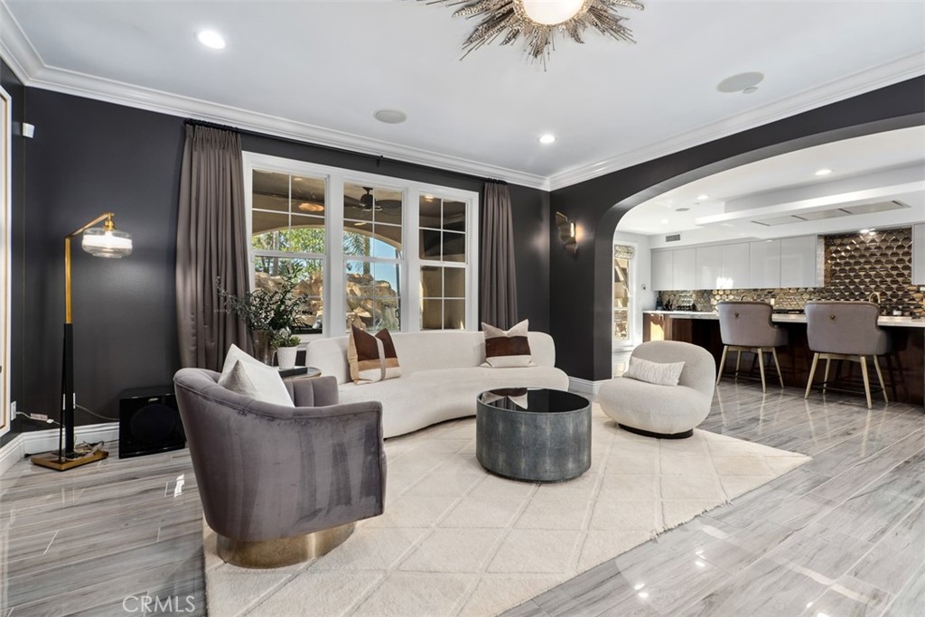 33 Basilica Place Ladera Ranch, CA 92694 - Photo 16 of 59 a living room with furniture and a potted plant