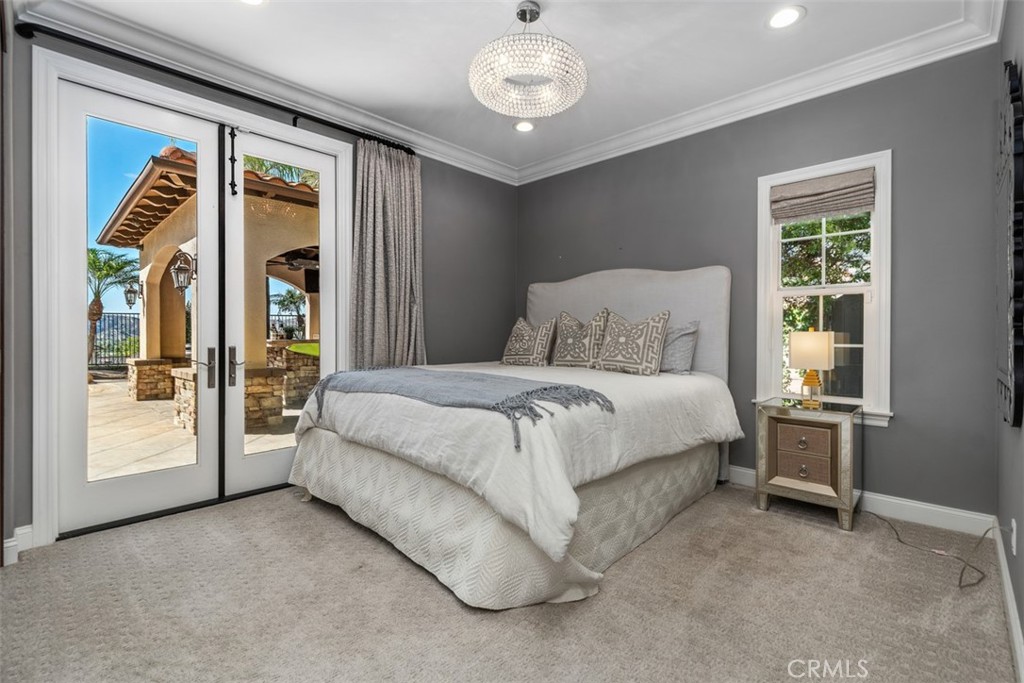 33 Basilica Place Ladera Ranch, CA 92694 - Photo 25 of 59 a bed sitting in a room next to a window