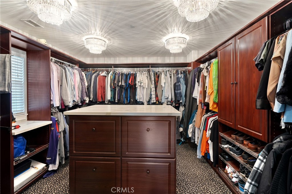 33 Basilica Place Ladera Ranch, CA 92694 - Photo 33 of 59 a view of a refrigerator and an furniture in a room