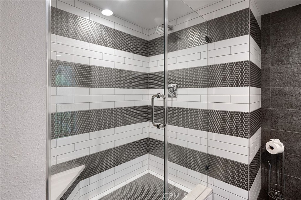 33 Basilica Place Ladera Ranch, CA 92694 - Photo 40 of 59 a bathroom with a shower