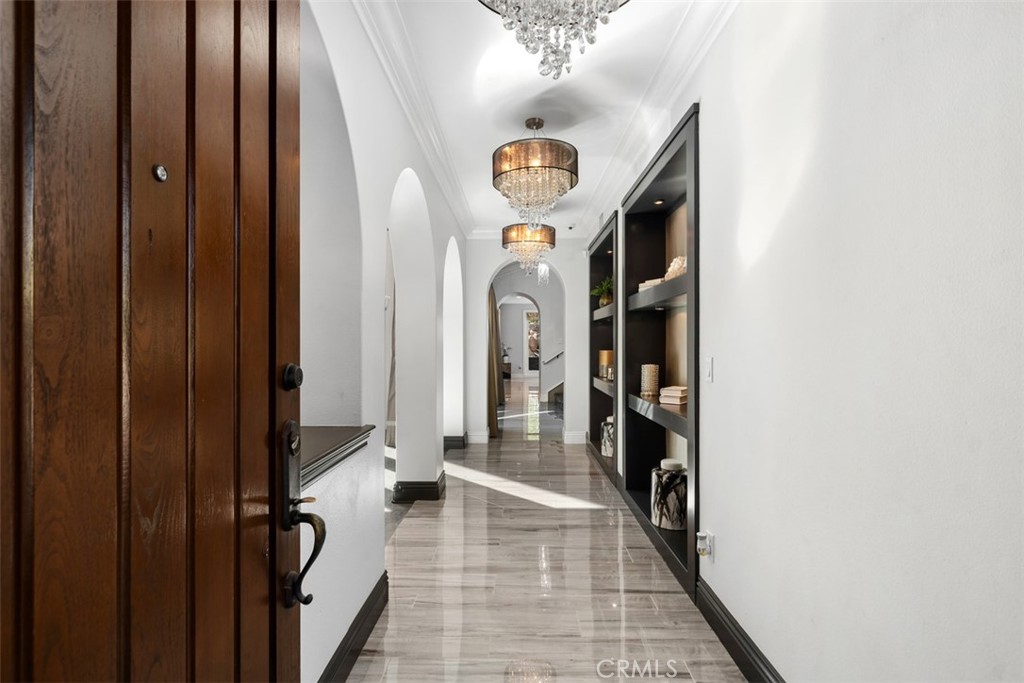 33 Basilica Place Ladera Ranch, CA 92694 - Photo 6 of 59 a view of a hallway with front door