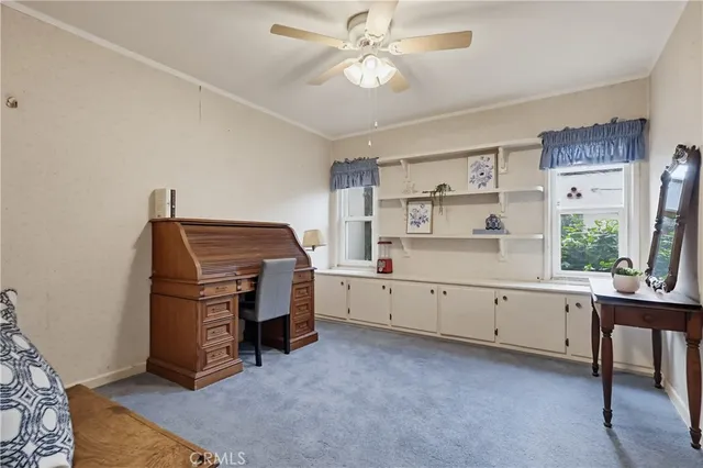 a room with furniture and windows