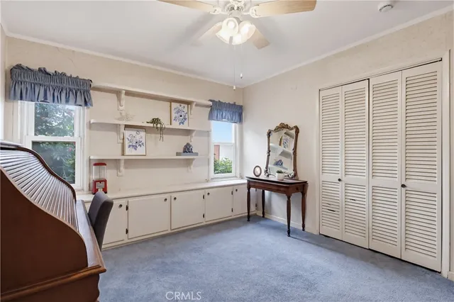 a room with cabinets and window