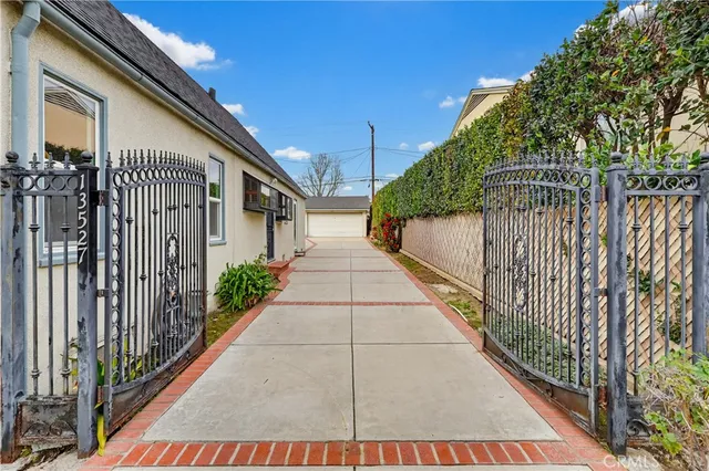 a path view of a house with a pathway