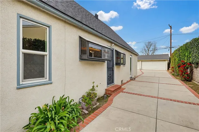 a front view of a house with a garage