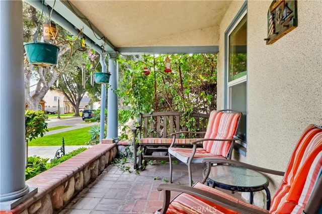 a chair and a table in a balcony