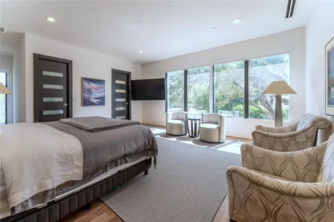 a bed room with a bed and a couch