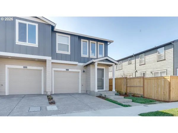 a black and white photo of a house