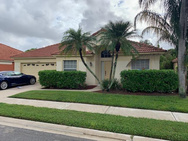 3013 Casa Rio Court Riviera Beach, FL 33418 - Photo 4 of 38 Front of the Home