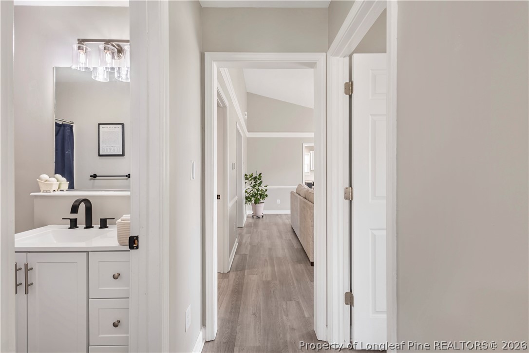 253 Farmstead Court Rockingham, NC 28379 - Photo 20 of 25 a view of a hallway with closet and a mirror