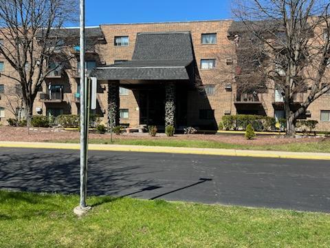 239 North Mill Road, Unit 405A Addison, IL 60101 - Photo 1 of 14 a view of a house with a swimming pool