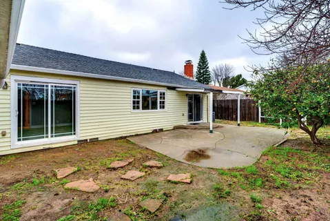 a view of a house with a patio