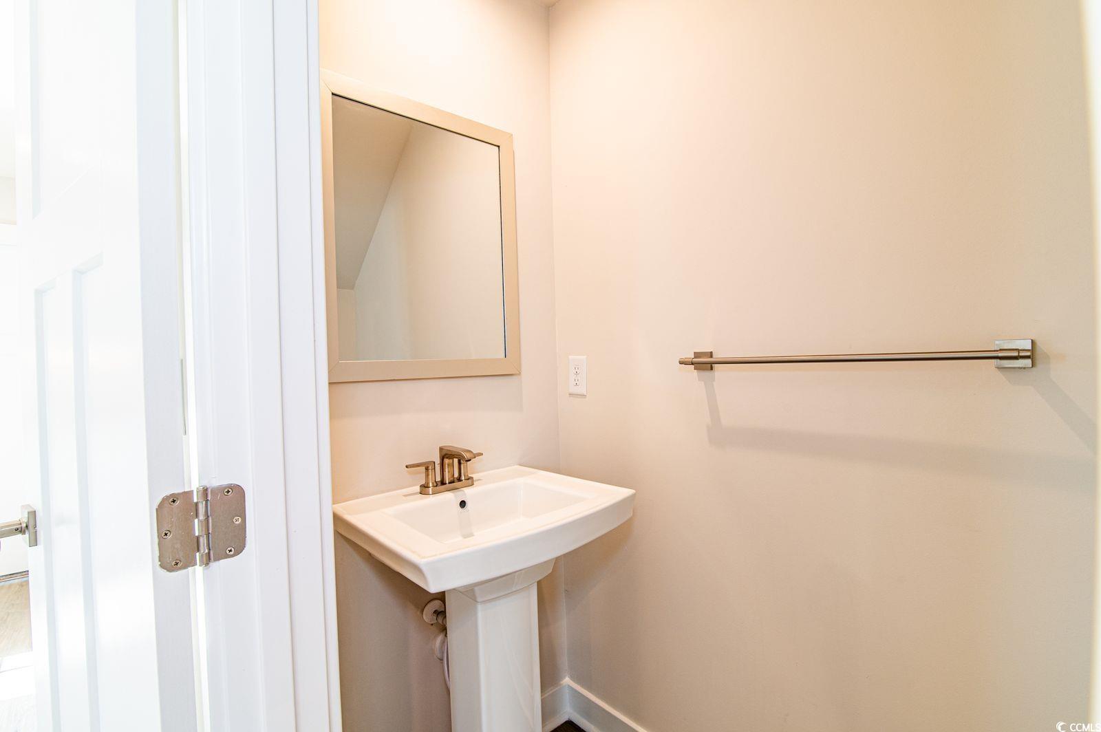 2812 Rowyn Street Longs, SC 29568 - Photo 11 of 27 Bathroom featuring baseboards