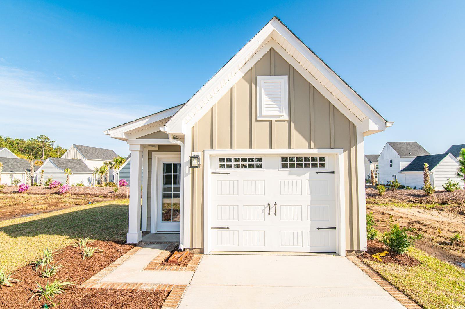 2812 Rowyn Street Longs, SC 29568 - Photo 21 of 27 Garage with driveway