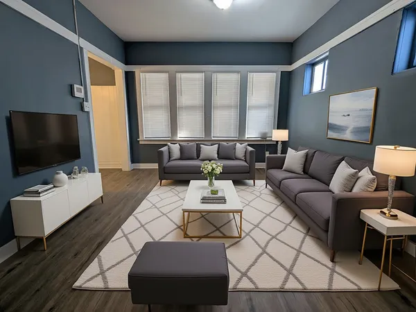 a living room with furniture and a flat screen tv