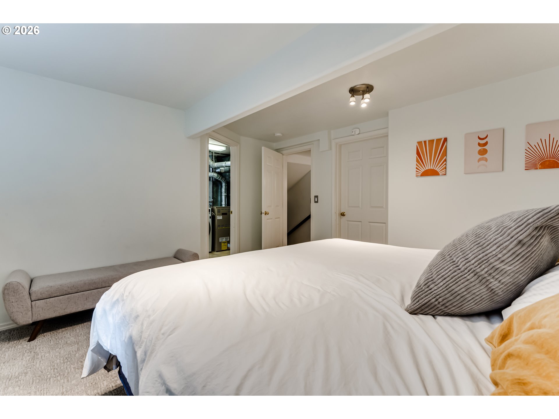 2736 Kismet Way Eugene, OR 97405 - Photo 35 of 48 a bedroom with a bed and a couch