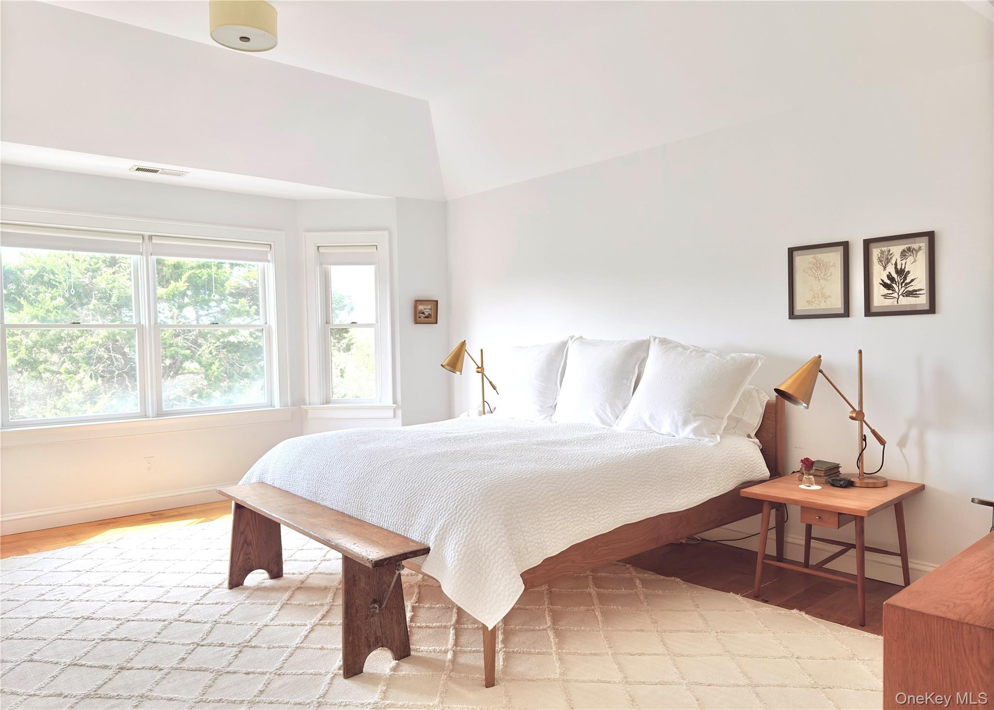 162 Dune Road Quogue, NY 11959 - Photo 14 of 28 a living room with furniture and a large window